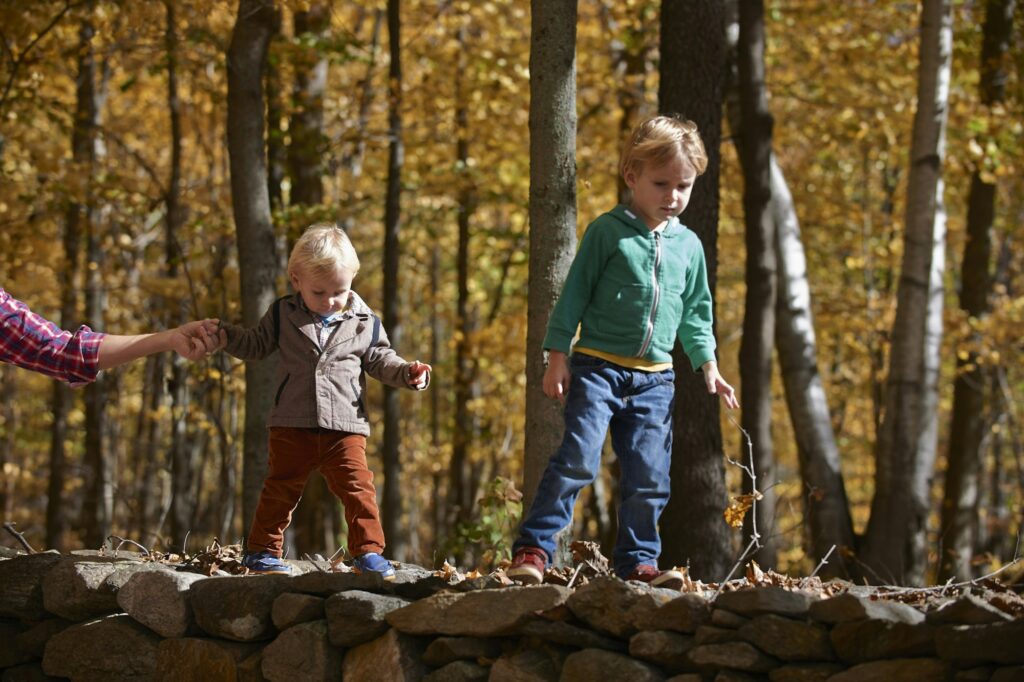 Family walking in forest